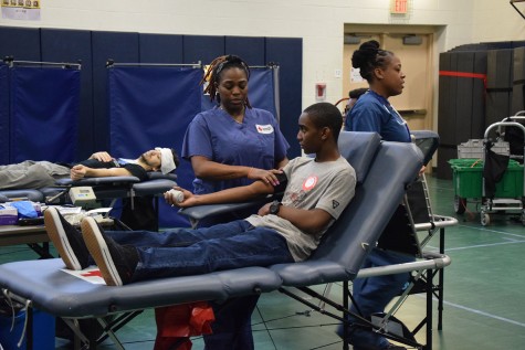 Dante Parks gets his blood pressure taken. 