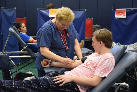 Caleb Story gets ready to get his blood taken. 