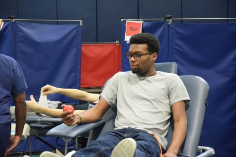 Jordan Tensley squeezes the stress ball to keep blood flowing. 