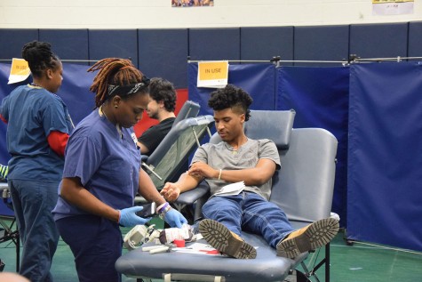 Cortne Lawrence finishes up getting his blood drawn. 