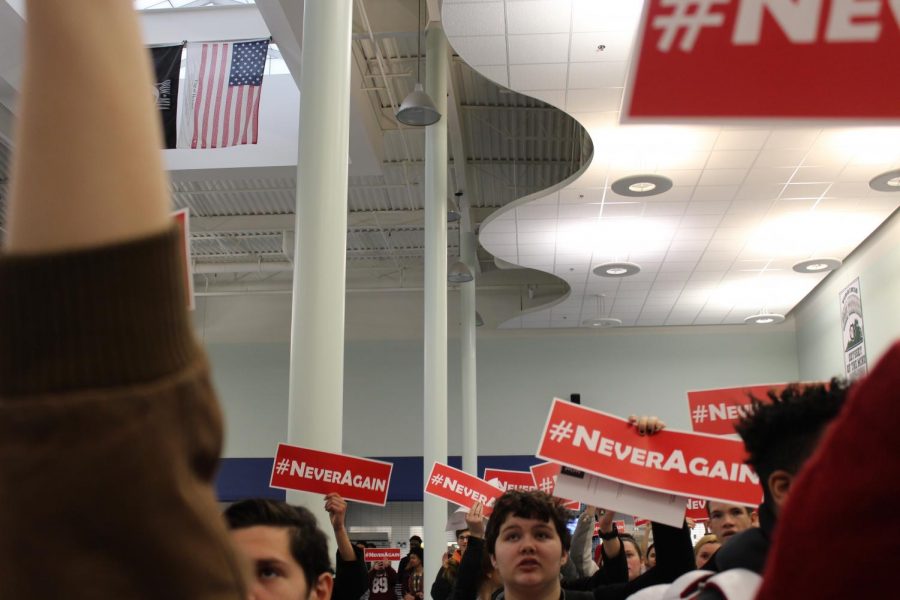 Students were encouraged to hold their signs up high to  express their passion for the cause. 