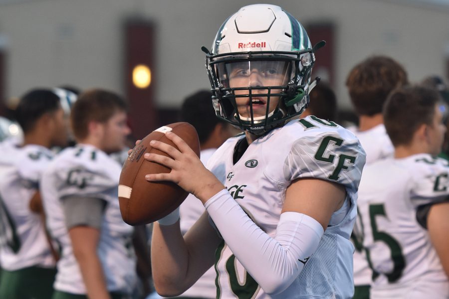 Madden Lowe warms up before the game against Riverbend on September 27.