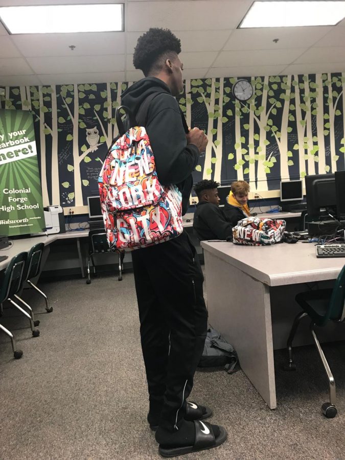 Noel Innocent (‘21) poses with his New York City Graffiti Backpack, which you can get on Robin Ruth USA for $40.