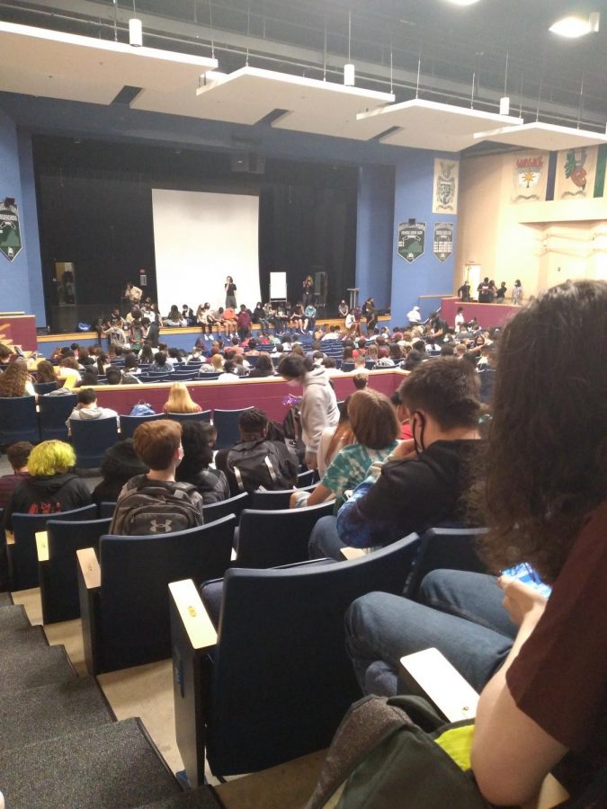 Students waiting in the auditorium for late buses. Photo: Jordan Mellender