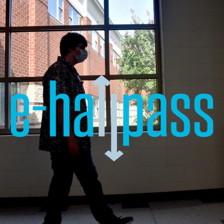 Steven Blackledge (24) walks down the halls after activating an e-hallpass.