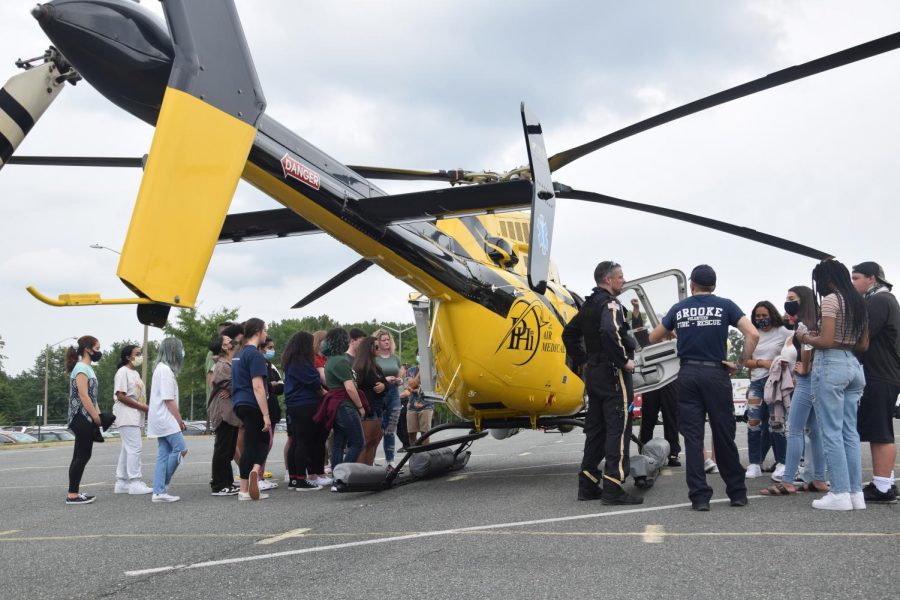 PHI Air Medial helicopter lands in the bus loop