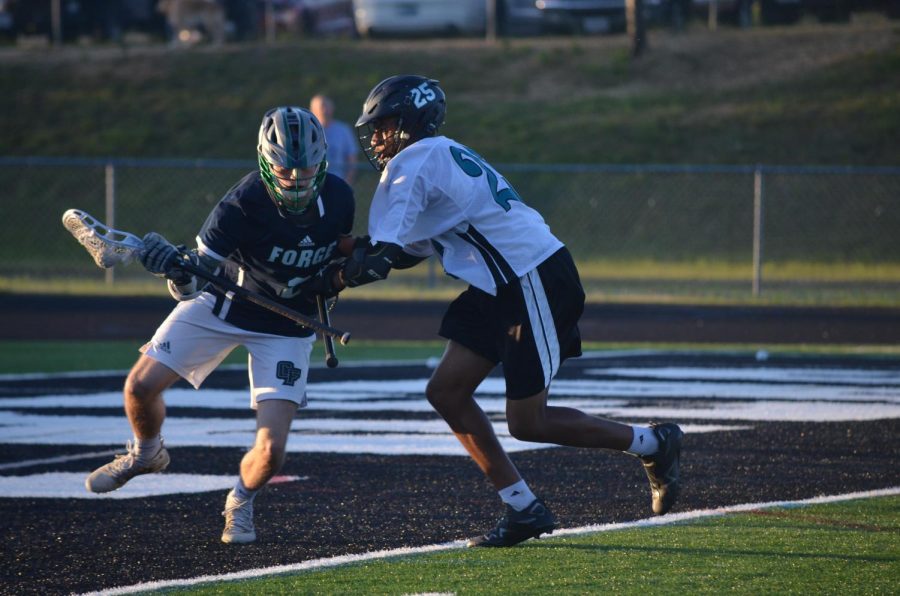 Forge senior Jakob Stone fights his way to the goal.