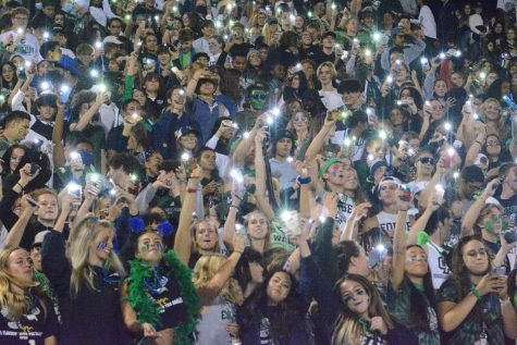 Green Wall sings Dont Stop Believing at the black-out football game on