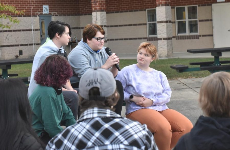 SAGE president Reagan Alex Marrs speaks to the protesting students, surrounded by his peers.