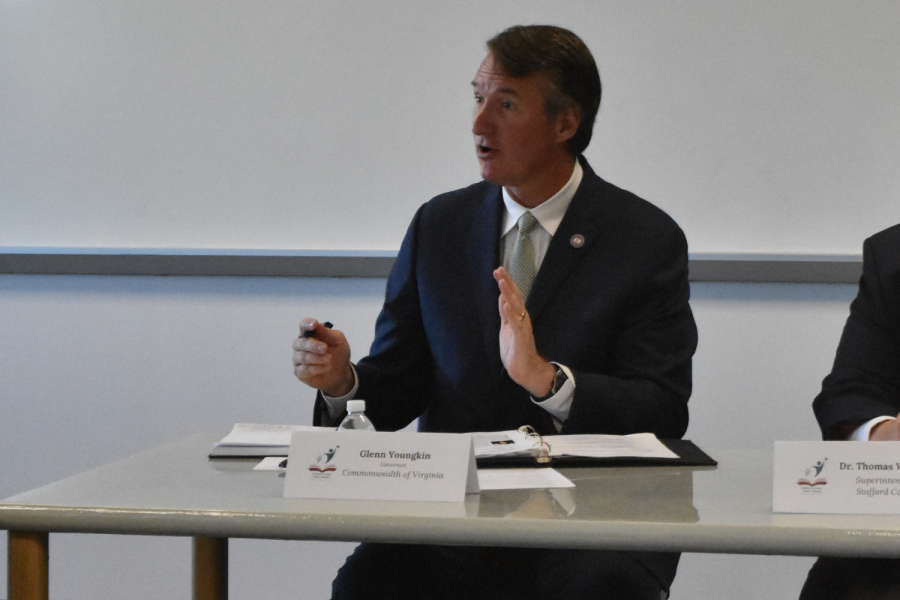 Governor Glenn Youngkin speaking at a meeting held at Forge, weeks later after this event he would announce the new gender support policies. 