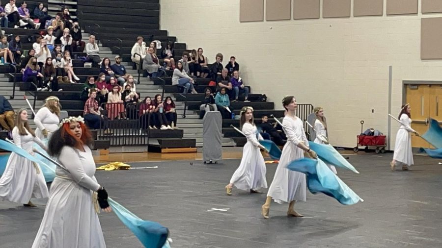 Winter guard performs their 2022 show “The Stones” at their final competition of the season at Powhatan High School in March. 
