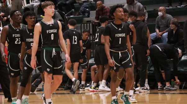 Elijah Wise (23) and Caleb Francis (23) walk onto the court to face the Warriors Nov. 29.