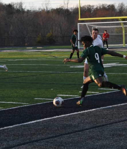 Forge player Keith Skudi (‘23) plays a long ball to  Pitts.