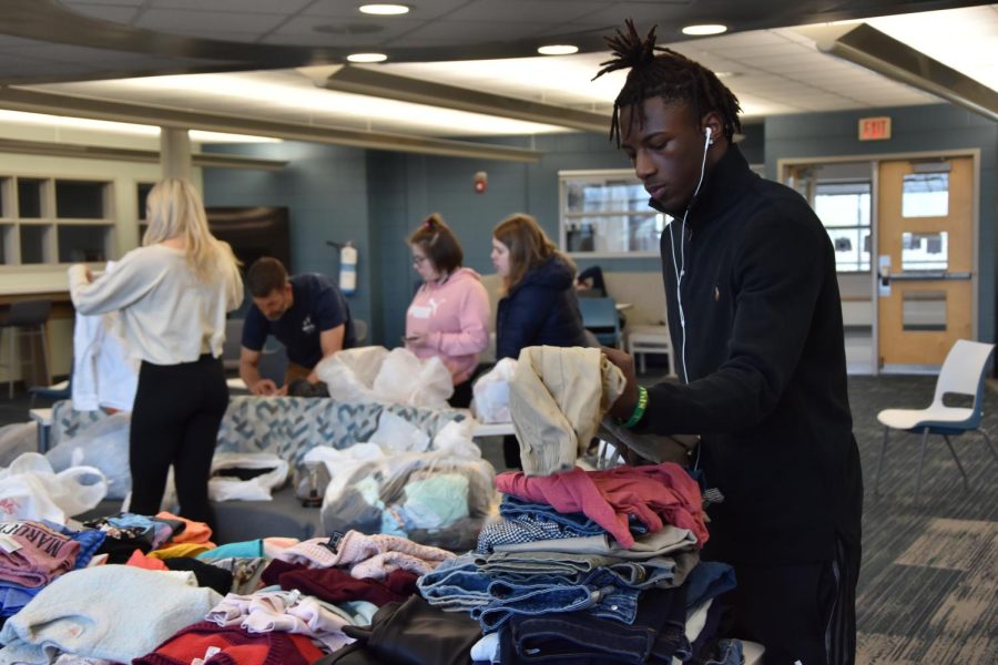 A student browses the various selection of Forge Thrift.