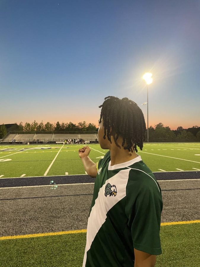 Frantz Fulcher (24) pointing to the opposing Mountain View.