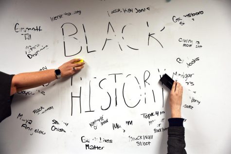 A Whiteboard was erased with the word "Black History" as well as black activists and movements.